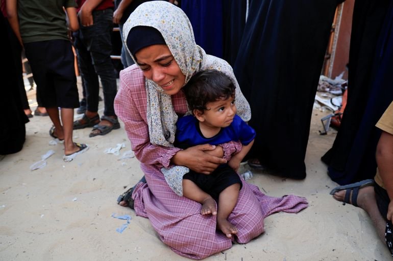 Israeli air strikes kill dozens in…
