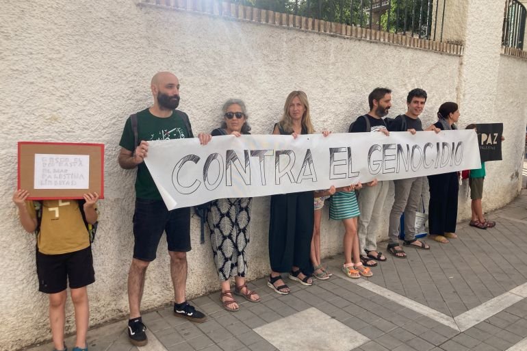 In Spain, parents gather at school…
