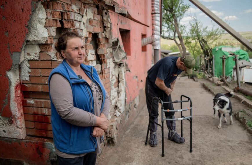 Ukrainian farmers risk lives to clear mines with rakes and tractors
